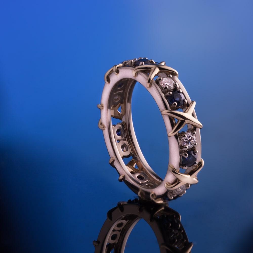 Кольцо из золота с сапфиром и бриллиантами 911293СБ