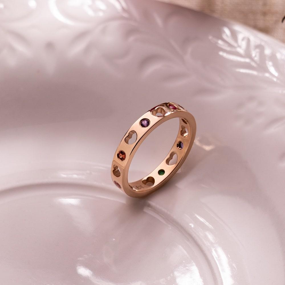 Кольцо из золота с сапфирами и с изумрудом 911633К