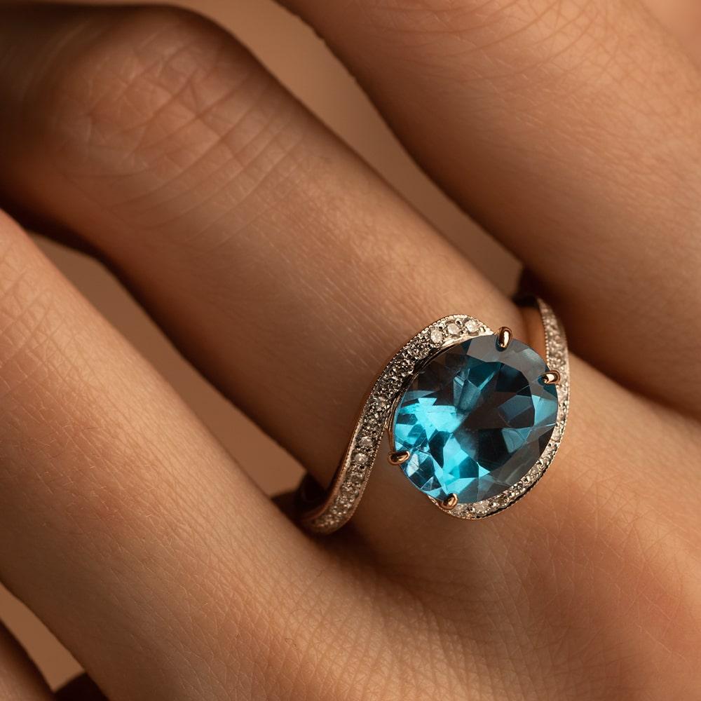 Кольцо из золота с топазом 911057Т